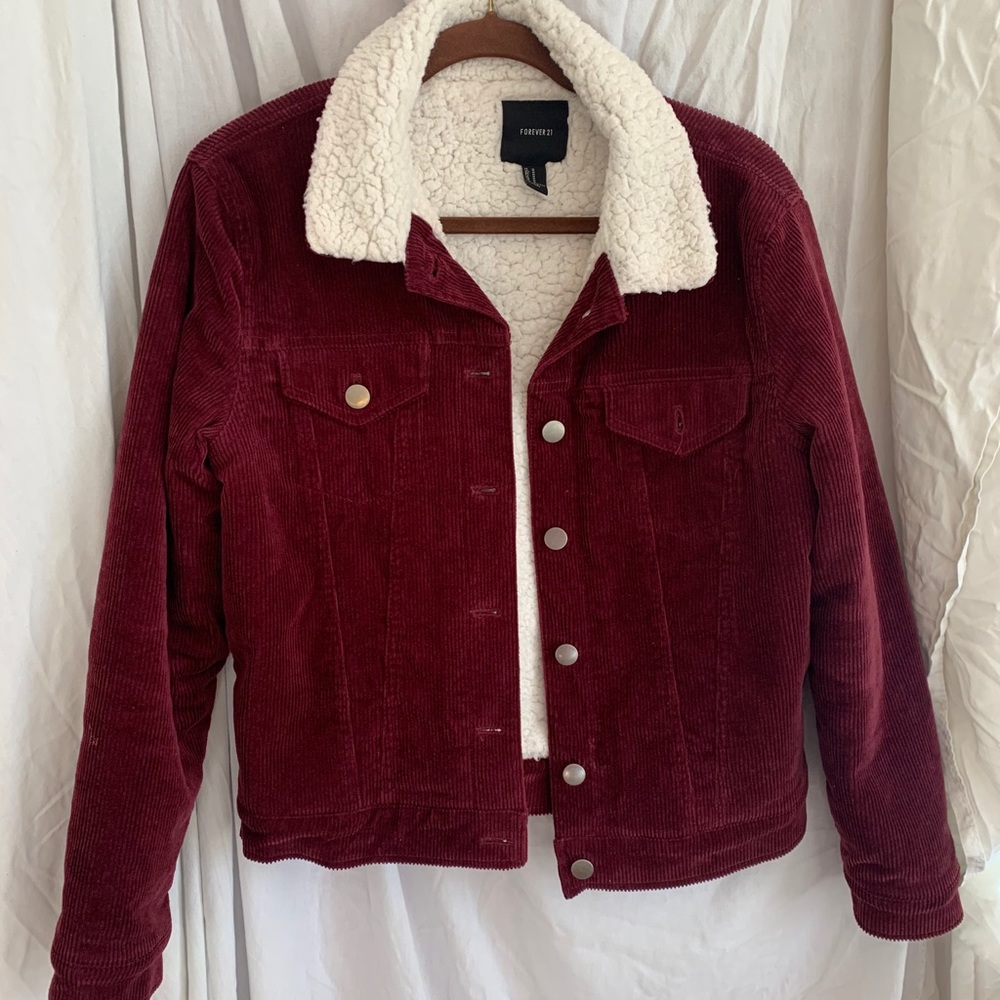 Maroon fuzzy sweater. Good quality.